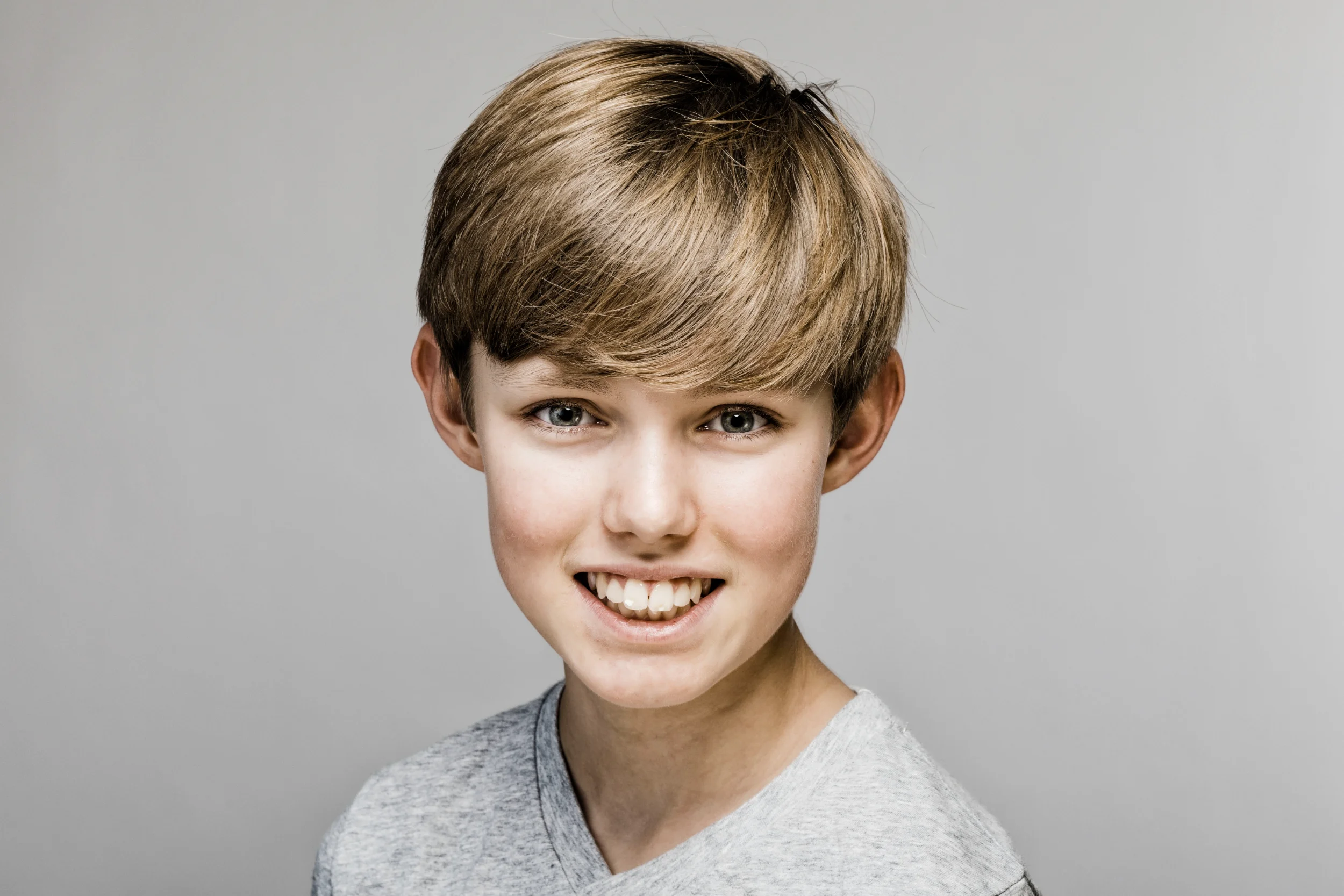 Visionsbillede – autentisk børneportræt med smil